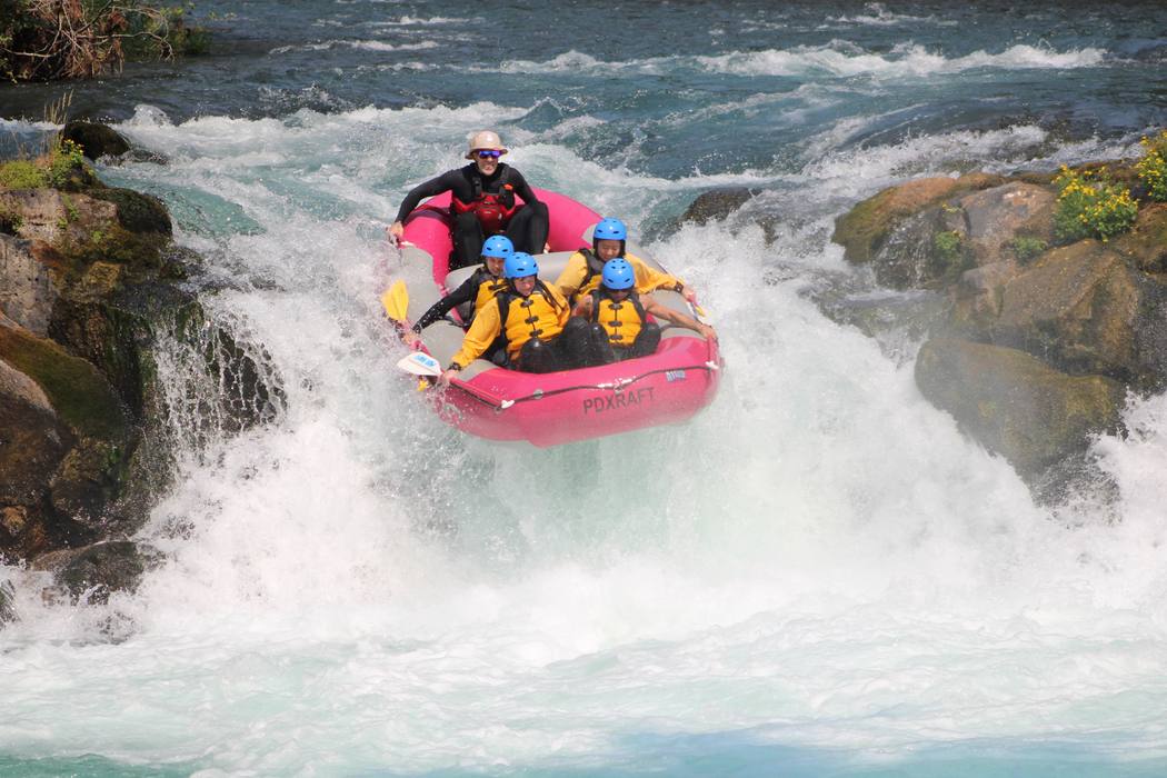 A raft dropping over Husum Falls on the White Salmon River